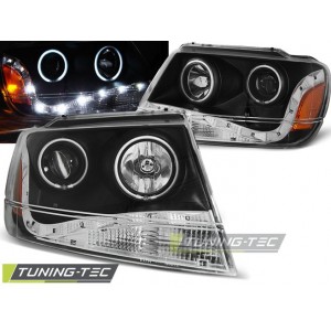 Předn&iacute; světla Jeep Grand Cherokee 99-05 s denn&iacute;m sv&iacute;cen&iacute;m &ndash; čern&aacute;